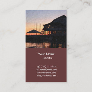 Tarjeta De Visita puesta de sol junto al lago con edificios con deck