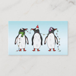 Tarjeta De Visita Tres pingüinos navideños festivos sobre azul claro
