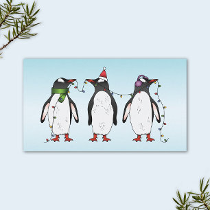 Tarjeta De Visita Tres pingüinos navideños festivos sobre azul claro