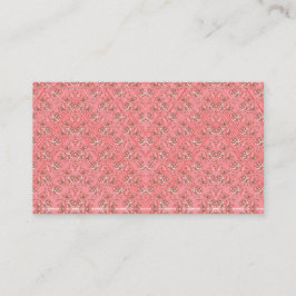 Tarjeta De Visita Una alfombra con motivos rojos y rosas decora el c
