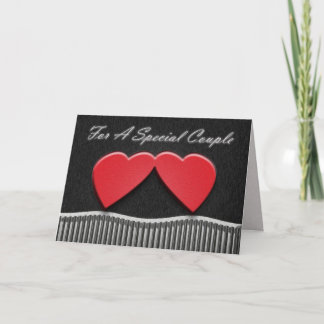 Tarjeta del aniversario de dos corazones
