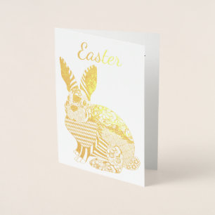 Tarjeta del conejito de pascua del oro