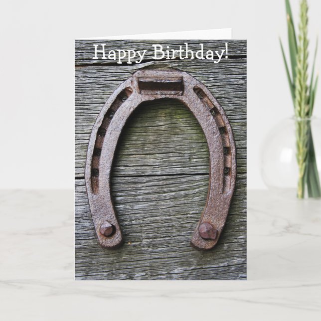 Tarjeta del feliz cumpleaños con la herradura en (Anverso)