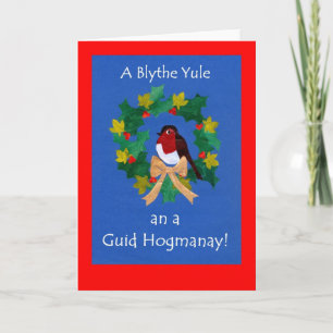 Tarjeta del petirrojo del navidad con el saludo