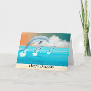 Tarjeta delfines respirando en el océano