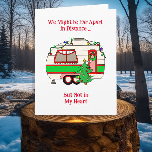 Tarjeta Deseándole una Feliz Navidad desde un Viajero