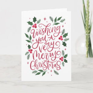 Tarjeta Deseándote unas Feliz Navidad con letras de manos