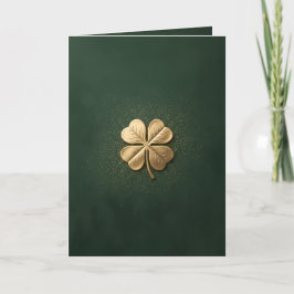 Tarjeta Día de San Patricio de trébol de cuatro hojas dora