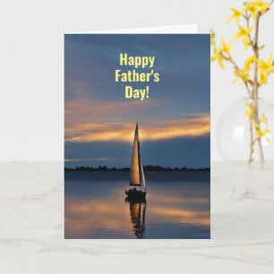 Tarjeta Día del Padre con hermoso barco de vela y puesta d