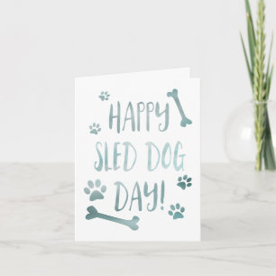 Tarjeta día del perro con trineo feliz