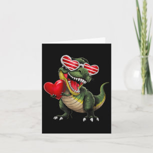 Tarjeta Dinosaur Trex sosteniendo corazón con gafas de sol