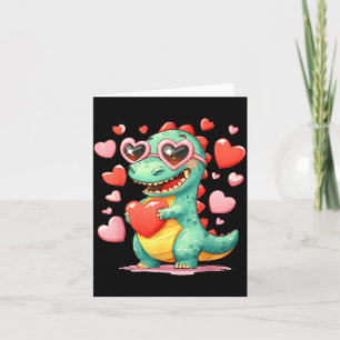 Tarjeta Dinosaurio de San Valentín Trex sosteniendo corazó