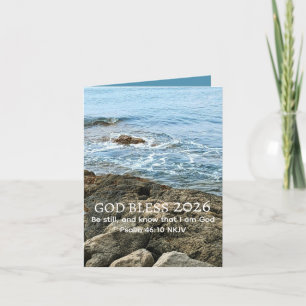 Tarjeta Dios bendiga el año nuevo 2026 Foto de mar azul pa