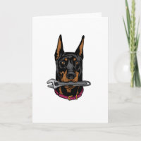 Doberman con llave inglesa