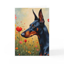Doberman en un campo de flores