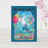 Dolphin Vestido gorra de cumpleaños sosteniendo el