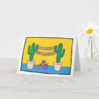 Dos candelabros de cacti con pancartas de feliz cu