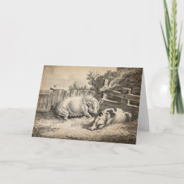 Tarjeta Dos cerdos yacen en la paja en una pluma exterior