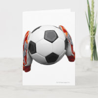 Dos guantes porteros sujetando un futbol