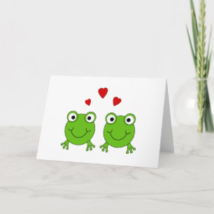 Tarjeta Dos ranas verdes con corazones rojos.