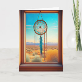 Tarjeta Dreamcatcher en una ventana del desierto