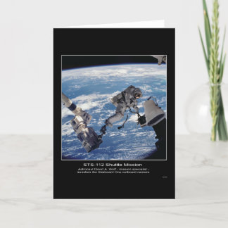 Tarjeta El astronauta David A. Wolf transfiere el O de