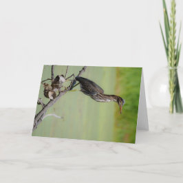 Tarjeta El cazador verde: Una garza verde en el reloj