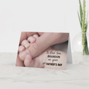 Tarjeta El hijo en el día del primer padre, mano en mano
