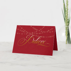 Tarjeta El navidad cree en rojo con la secuencia de la luz