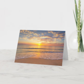 Tarjeta El sol de la mañana en la playa