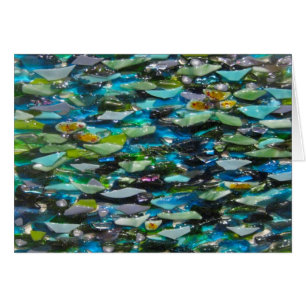 Tarjeta en blanco de los guijarros del agua