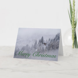Tarjeta en blanco suiza de las Felices Navidad del