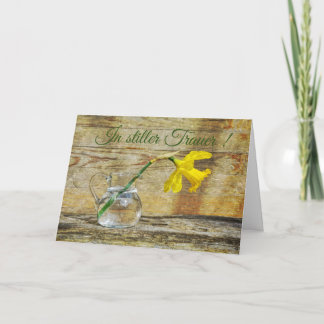 Tarjeta En silencio duelo con narciso amarillo
