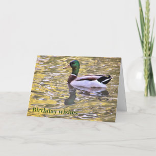 Tarjeta En una carta de deseos de cumpleaños dorada