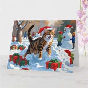 Tarjeta Escena festiva de nieve de Navidad con gato Bengal