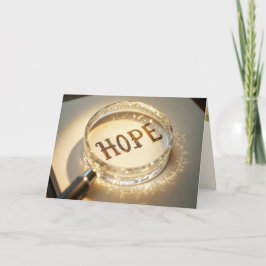 Tarjeta ESPERANZA bajo un cristal de aumento pensando en t