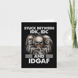 Tarjeta Esqueleto atascado entre Idk Idc e Idgaf (atrás)