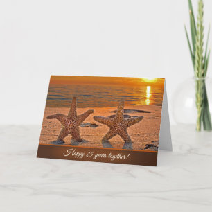 Tarjeta Estrella de mar aniversario en la playa del atarde