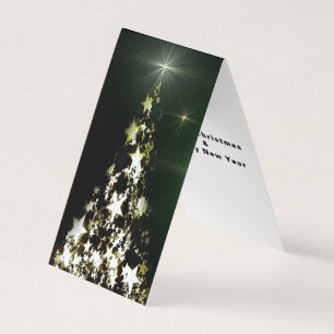 Tarjeta Estrellas en la noche del cielo de Navidad con tar