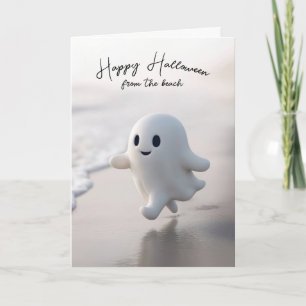 Tarjeta Fantasma de Halloween lindo corriendo en una playa