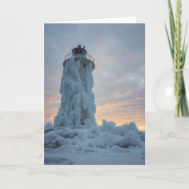Tarjeta faro costero en invierno