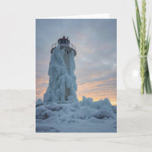 Tarjeta faro costero en invierno