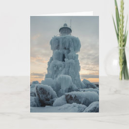 Tarjeta faro costero en invierno