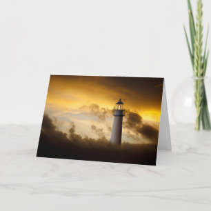 Tarjeta Faro que brilla intensamente debajo del cielo
