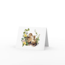 Felices Ducklings con flores en BLANK