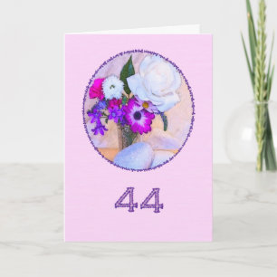 Tarjeta Feliz 44º cumpleaños con un cuadro de flores