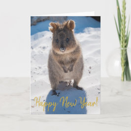 Tarjeta Feliz Año Nuevo con Quokka en la playa de Australi