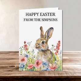 Tarjeta Feliz Conejo acuático de Pascua en familia de flor