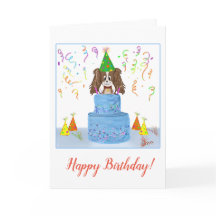 Feliz cumpleaños Cavalier King Charles con pastel