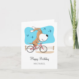 Tarjeta Feliz cumpleaños perro cachorro ciclismo en bicicl